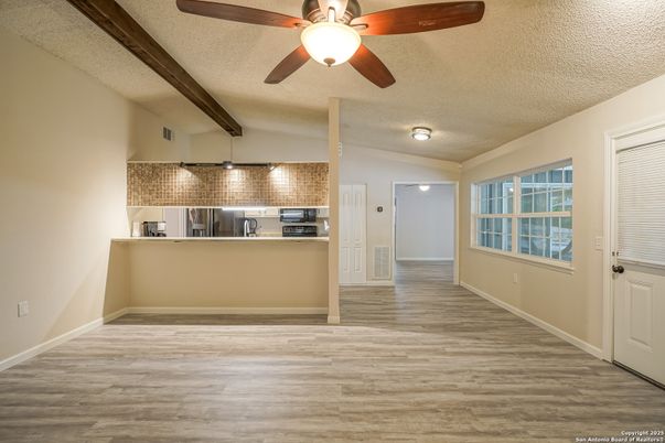 Empty room, Interior, Kitchen, Stainless Steel Appliances, Wooden Beams, Wood Texture Flooring