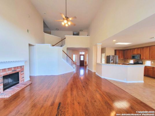 Fireplace, Interior, Kitchen, Recessed Lighting, Wood Texture Flooring
