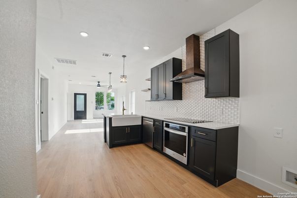 Interior, Kitchen, Pendant Lights, Recessed Lighting, Stainless Steel Appliances, Wood Texture Flooring