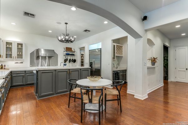 Chandelier, Interior, Kitchen, Recessed Lighting, Stainless Steel Appliances, Wood Texture Flooring