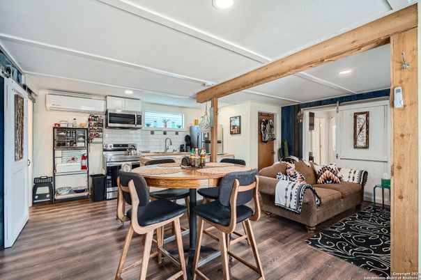 Dining room, Interior, Kitchen, Living room, Recessed Lighting, Stainless Steel Appliances, Wooden Beams, Wood Texture Flooring