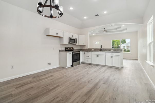 Interior, Kitchen, Pendant Lights, Recessed Lighting, Stainless Steel Appliances, Wood Texture Flooring