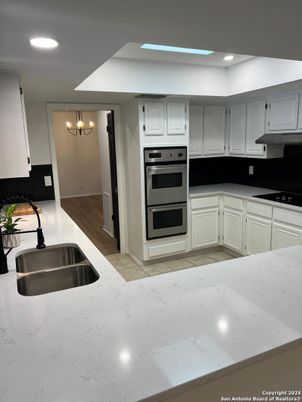 Chandelier, Interior, Kitchen, Recessed Lighting, Stainless Steel Appliances, Wood Texture Flooring