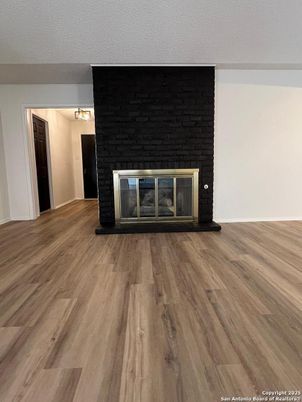 Empty room, Fireplace, Interior, Stone Walls, Wood Texture Flooring