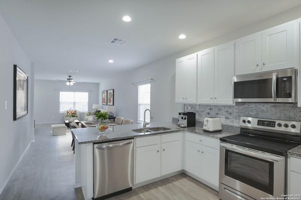 Dining room, Interior, Kitchen, Recessed Lighting, Stainless Steel Appliances, Wood Texture Flooring