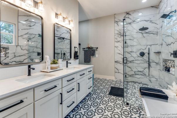 Bathroom, Dual Sink Vanities, Glass Shower, Interior, Marble Walls, Recessed Lighting