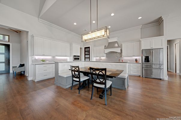 Dining room, Interior, Kitchen, Pendant Lights, Recessed Lighting, Stainless Steel Appliances, Wood Texture Flooring