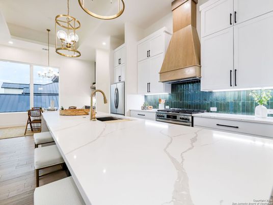 Chandelier, Dining room, Interior, Kitchen, Pendant Lights, Recessed Lighting, Stainless Steel Appliances, Wood Texture Flooring