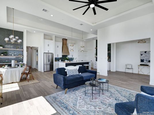Chandelier, Interior, Kitchen, Living room, Pendant Lights, Recessed Lighting, Stainless Steel Appliances, Wood Texture Flooring