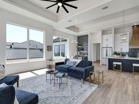 Chandelier, Dining room, Interior, Kitchen, Living room, Pendant Lights, Recessed Lighting, Stainless Steel Appliances, Wood Texture Flooring