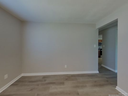 Empty room, Interior, Kitchen, Stainless Steel Appliances, Wood Texture Flooring