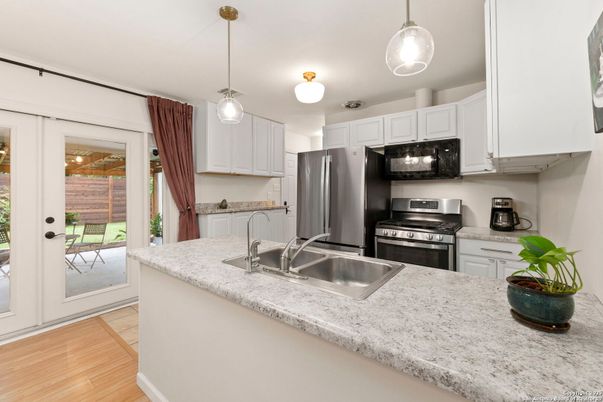 Interior, Kitchen, Pendant Lights, Stainless Steel Appliances, Wood Texture Flooring
