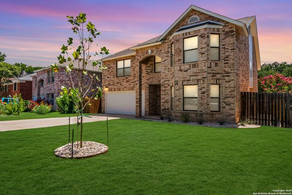 Attached, Backyard, Exterior, Facade, Brick Facade, Brick Traditional