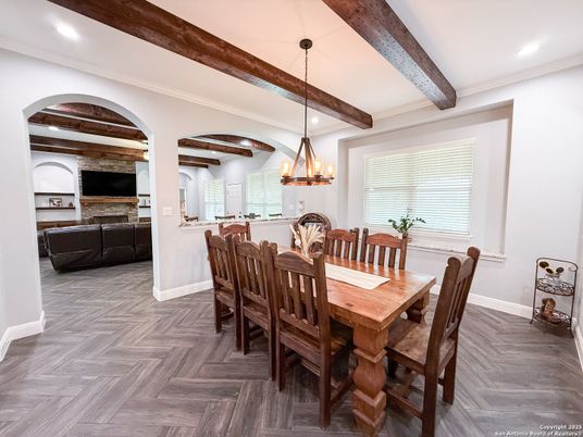 Chandelier, Dining room, Interior, Pendant Lights, Recessed Lighting, Wooden Beams, Wood Texture Flooring