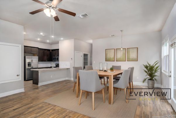 Dining room, Interior, Kitchen, Pendant Lights, Recessed Lighting, Stainless Steel Appliances, Wood Texture Flooring