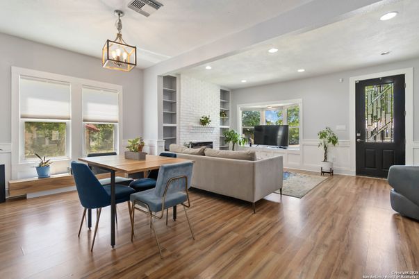Dining room, Fireplace, Interior, Living room, Pendant Lights, Recessed Lighting, Wood Texture Flooring