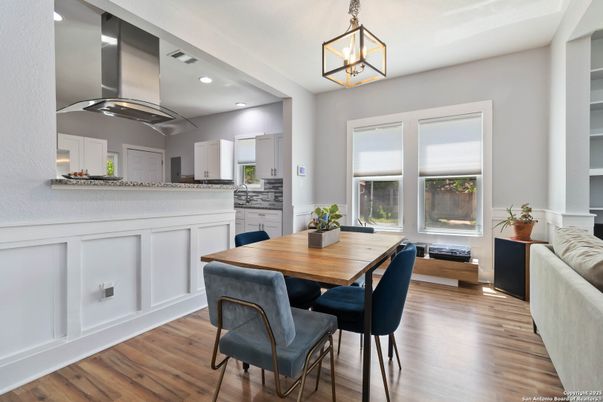 Dining room, Interior, Kitchen, Pendant Lights, Recessed Lighting, Stainless Steel Appliances, Wood Texture Flooring