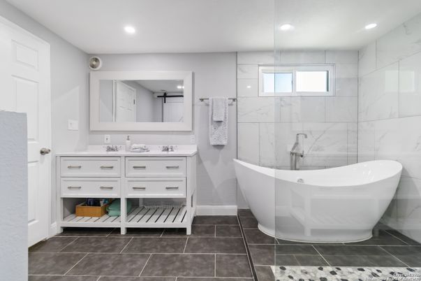 Bathroom, Dual Sink Vanities, Free Standing Baths, Interior, Marble Walls, Recessed Lighting