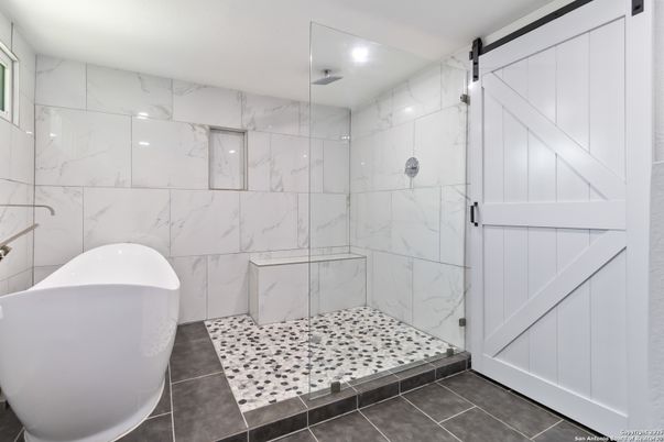 Bathroom, Free Standing Baths, Glass Shower, Interior, Marble Walls, Recessed Lighting
