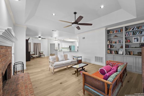 Fireplace, Interior, Kitchen, Living room, Recessed Lighting, Stone Walls, Wood Texture Flooring