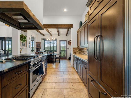 Chandelier, Dining room, Interior, Kitchen, Recessed Lighting, Stainless Steel Appliances, Wooden Beams