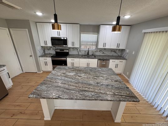 Interior, Kitchen, Pendant Lights, Recessed Lighting, Stainless Steel Appliances, Wood Texture Flooring