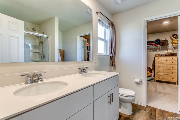 Bathroom, Dual Sink Vanities, Interior, Recessed Lighting, Wood Texture Flooring