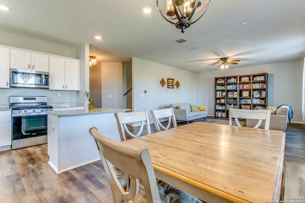 Dining room, Interior, Kitchen, Recessed Lighting, Stainless Steel Appliances, Wood Texture Flooring