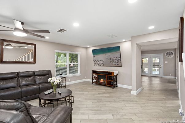 Fireplace, Interior, Living room, Recessed Lighting, Wood Texture Flooring
