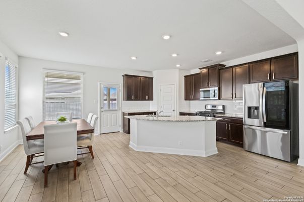 Dining room, Interior, Kitchen, Recessed Lighting, Stainless Steel Appliances, Wood Texture Flooring