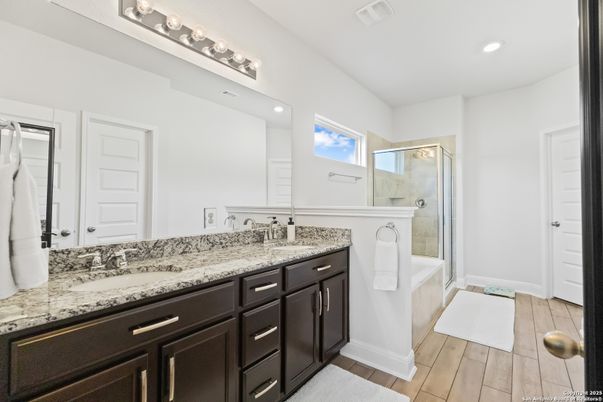 Bathroom, Dual Sink Vanities, Glass Shower, Interior, Recessed Lighting, Wood Texture Flooring