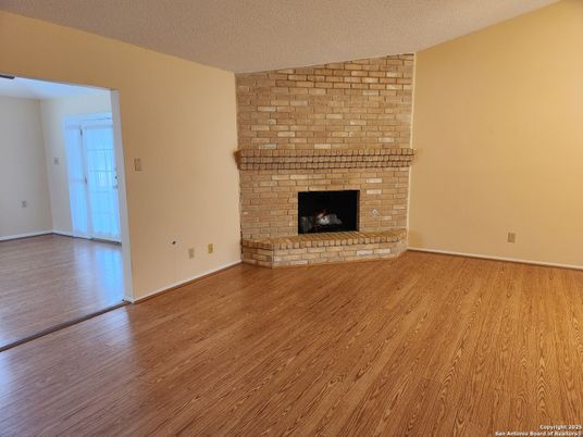 Empty room, Fireplace, Interior, Stone Walls, Wood Texture Flooring