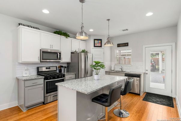Interior, Kitchen, Pendant Lights, Recessed Lighting, Stainless Steel Appliances, Wood Texture Flooring