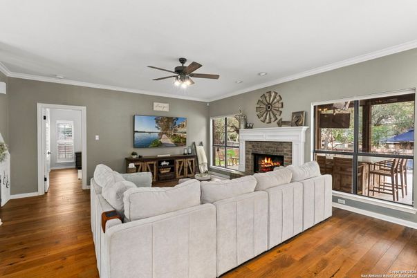 Fireplace, Interior, Living room, Recessed Lighting, Wood Texture Flooring