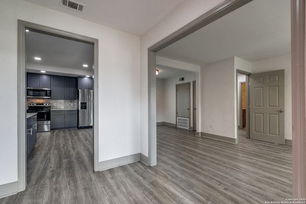 Interior, Kitchen, Recessed Lighting, Stainless Steel Appliances, Wood Texture Flooring