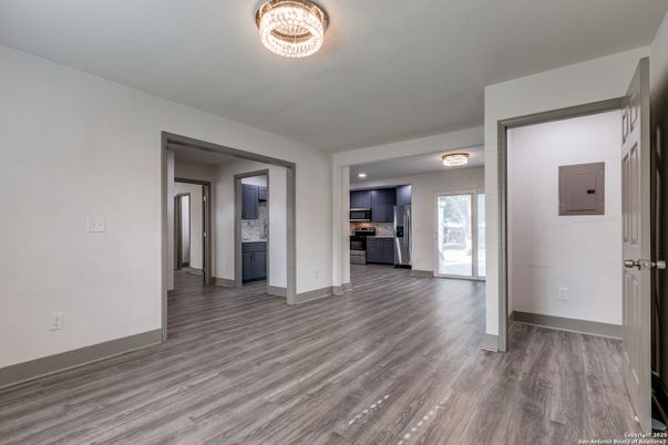 Empty room, Interior, Kitchen, Stainless Steel Appliances, Wood Texture Flooring