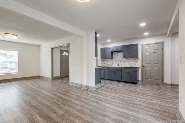 Interior, Kitchen, Marble Walls, Recessed Lighting, Wood Texture Flooring