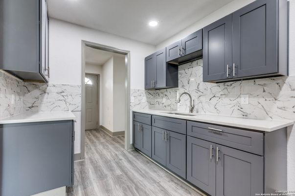 Interior, Kitchen, Marble Walls, Recessed Lighting, Wood Texture Flooring