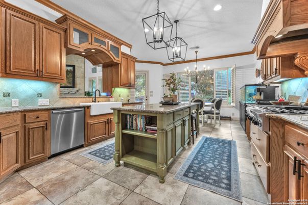 Chandelier, Dining room, Interior, Kitchen, Pendant Lights, Recessed Lighting, Stainless Steel Appliances