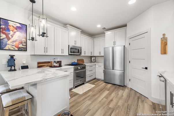 Interior, Kitchen, Pendant Lights, Recessed Lighting, Stainless Steel Appliances, Wood Texture Flooring