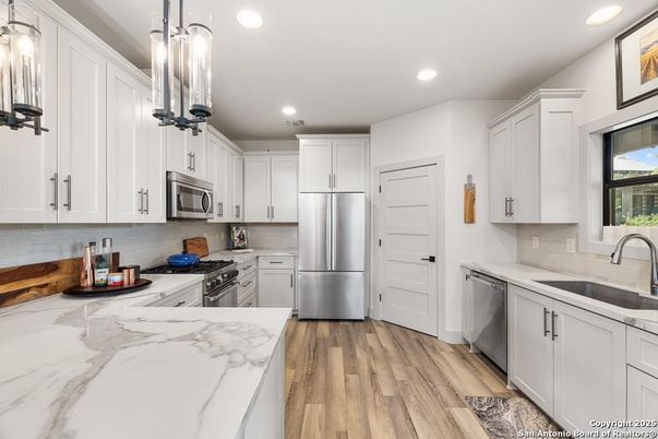 Interior, Kitchen, Recessed Lighting, Stainless Steel Appliances, Wood Texture Flooring