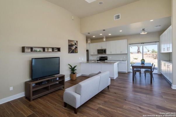 Dining room, Interior, Kitchen, Recessed Lighting, Stainless Steel Appliances, Wood Texture Flooring