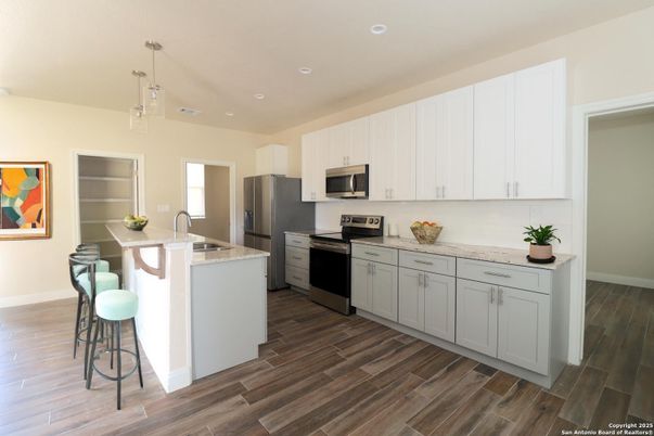 Interior, Kitchen, Pendant Lights, Recessed Lighting, Stainless Steel Appliances, Wood Texture Flooring