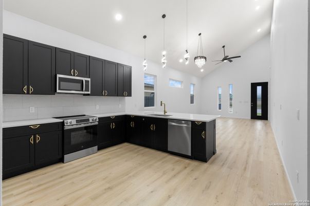 Interior, Kitchen, Pendant Lights, Recessed Lighting, Stainless Steel Appliances, Wood Texture Flooring