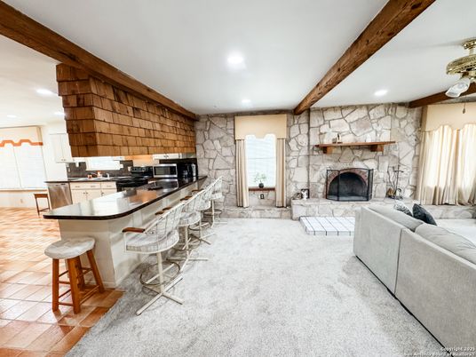Fireplace, Interior, Kitchen, Living room, Recessed Lighting, Stone Walls, Wooden Beams