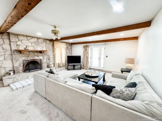 Fireplace, Interior, Living room, Recessed Lighting, Stone Walls, Wooden Beams