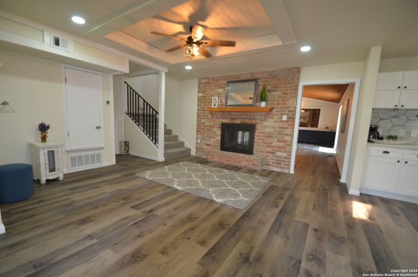 Fireplace, Interior, Recessed Lighting, Stone Walls, Wood Texture Flooring