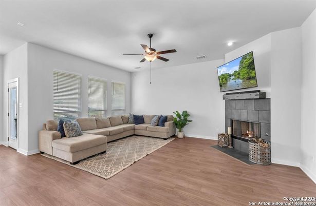 Fireplace, Interior, Living room, Recessed Lighting, Wood Texture Flooring