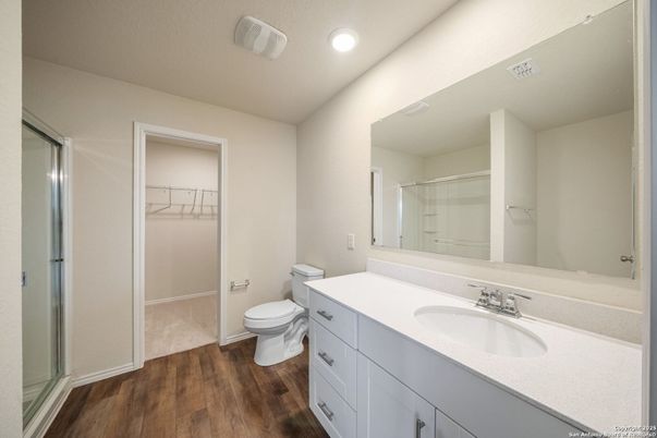 Bathroom, Glass Shower, Interior, Recessed Lighting, Walk-in Closets, Wood Texture Flooring