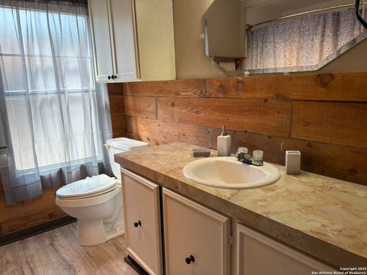 Bathroom, Interior, Tile Countertops, Wood Texture Flooring, Wooden Walls